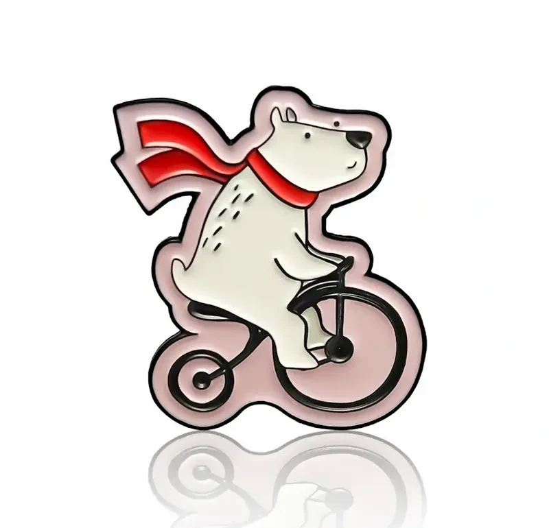 pin miś polarny na rowerze.webp