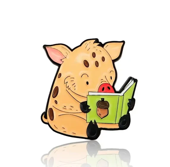 pin świnka z książką.webp